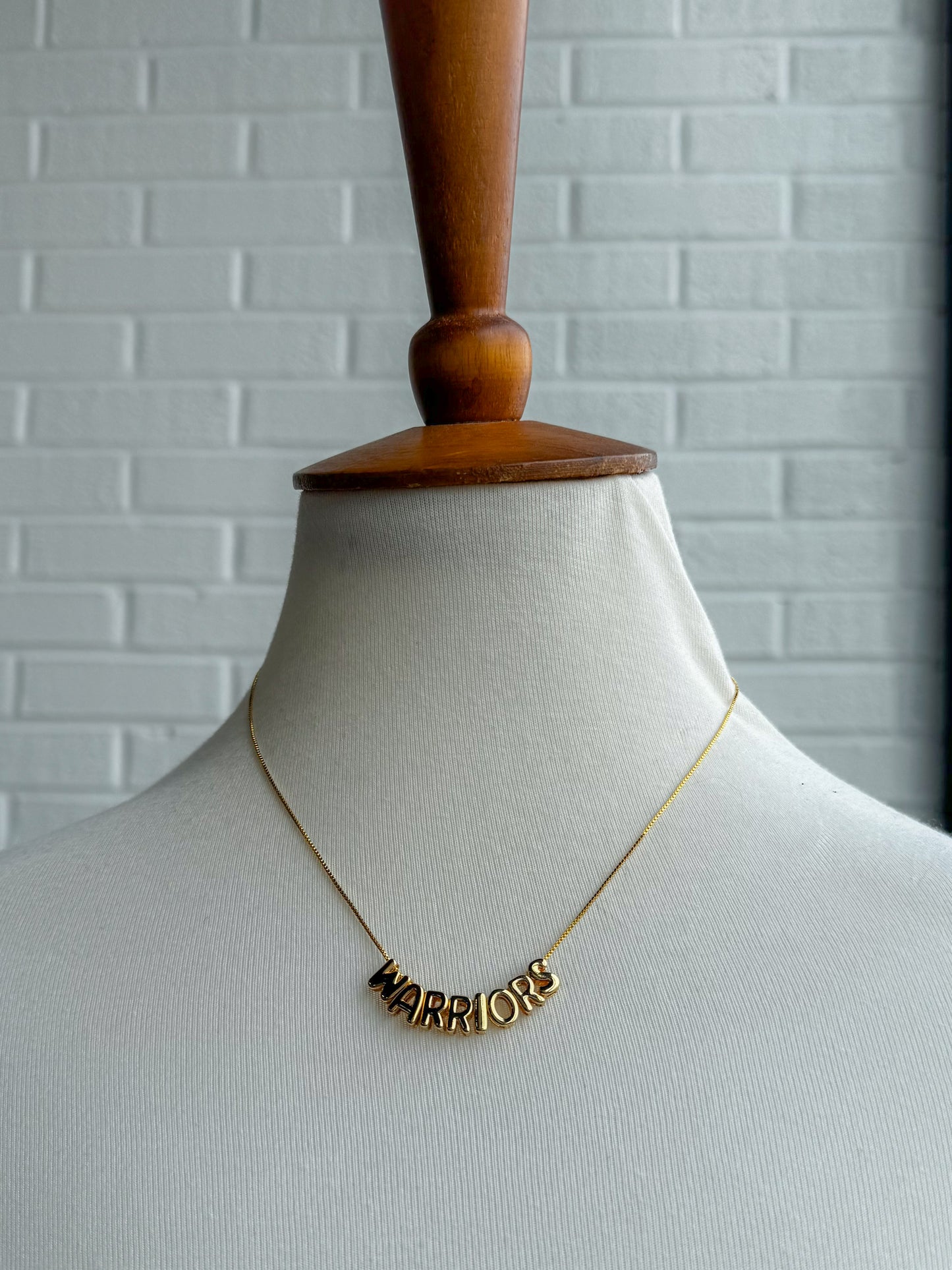 - Dainty Gold Warrior Necklace -
